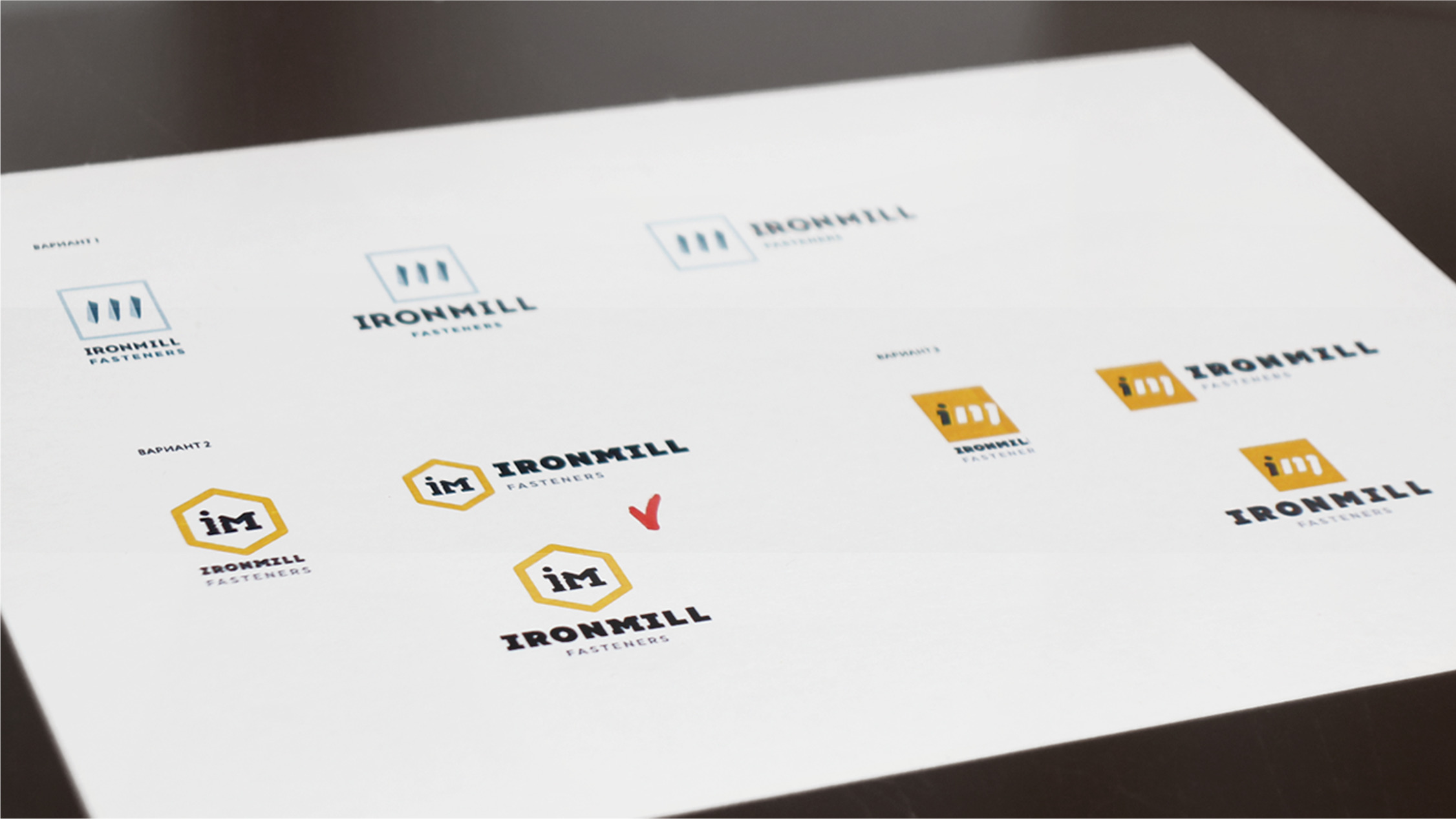 A bold step in a totally different direction: the abbreviation of the company name. We camouflage a screw in the counterform between I and M.